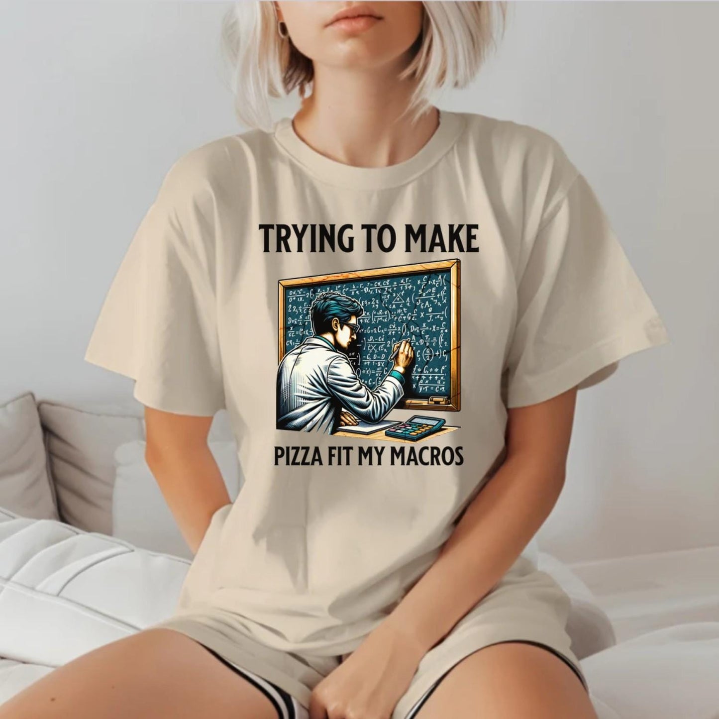 Alt text: "Humorous gym T-shirt design featuring a lab-coated character calculating pizza macros, perfect for fitness enthusiasts who love food."
