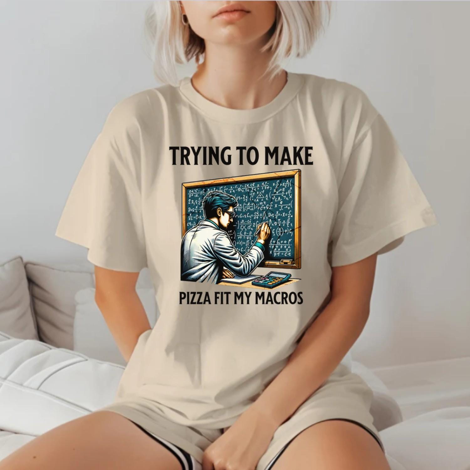 Alt text: "Humorous gym T-shirt design featuring a lab-coated character calculating pizza macros, perfect for fitness enthusiasts who love food."