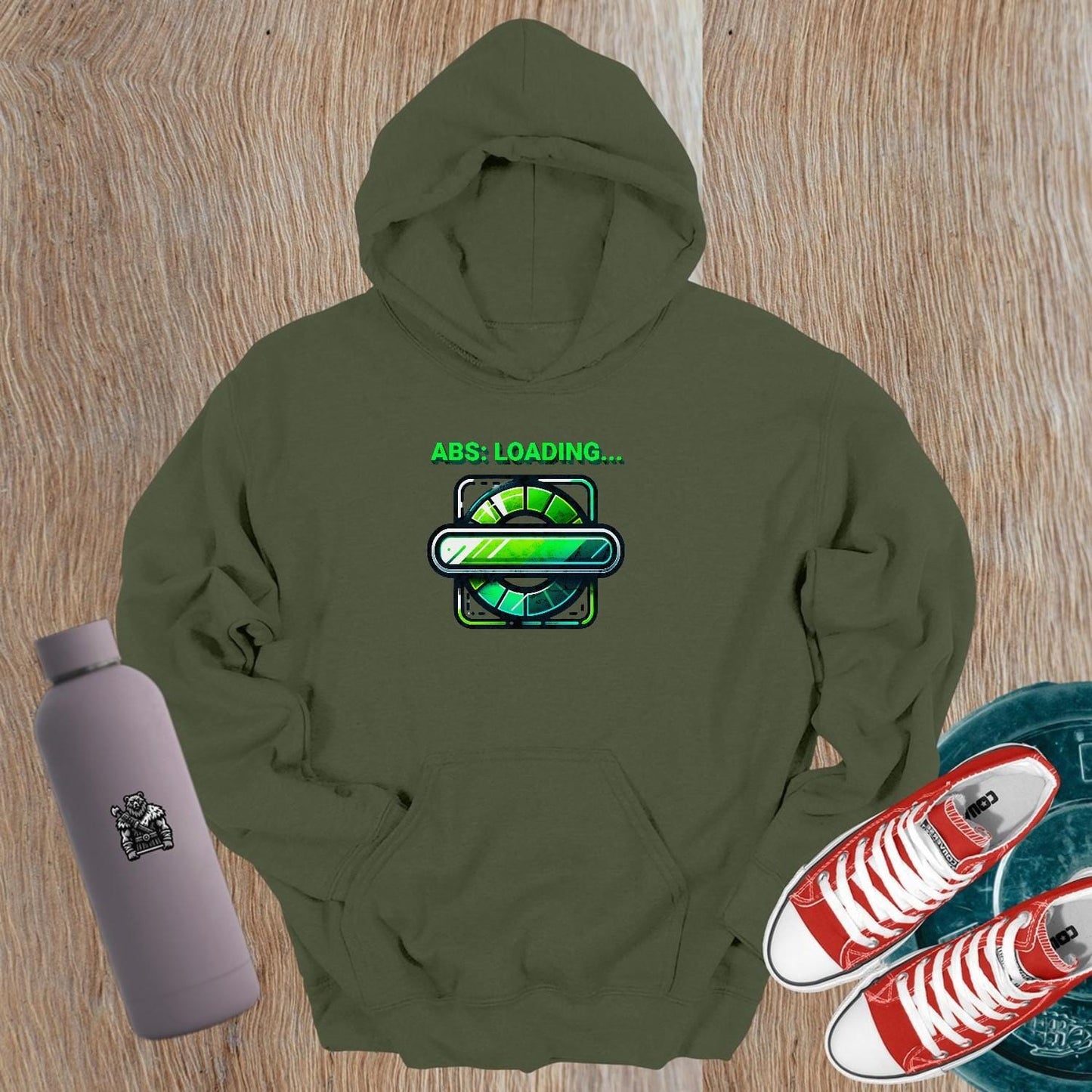 Alt text: "Vibrant gym hoodie featuring 'ABS: LOADING...' graphic, perfect for fitness enthusiasts. Ideal for workouts and casual wear."