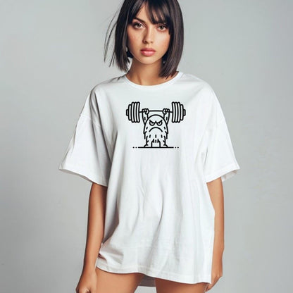"Graphic T-shirt featuring a fierce creature lifting weights, perfect for gym enthusiasts. Motivational, stylish workout apparel design."