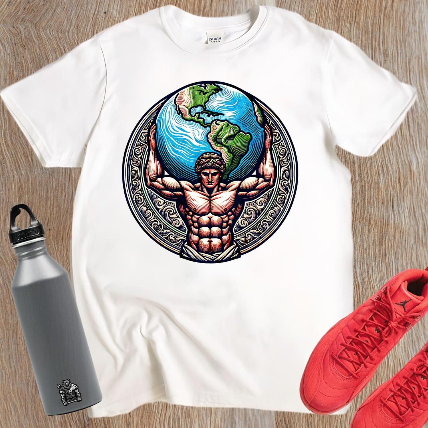 "Dynamic gym T-shirt featuring a powerful figure holding the world, symbolizing strength and resilience for fitness enthusiasts."