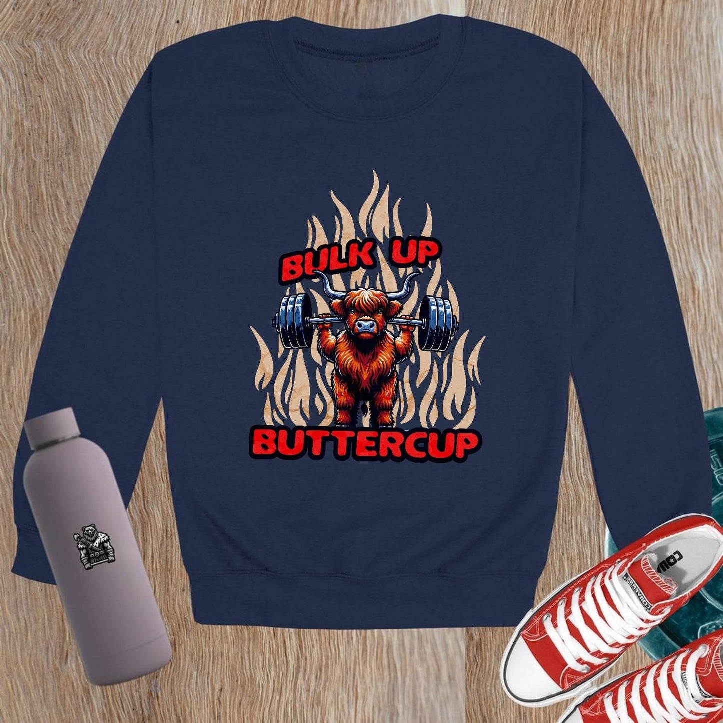 "Graphic crewneck sweatshirt featuring 'Bulk Up Buttercup' design, perfect for gym workouts or casual wear, inspiring fit lifestyle."