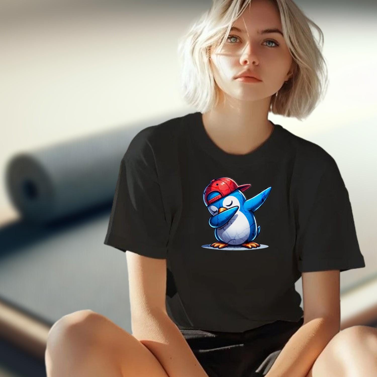 Alt text: "Vibrant gym T-shirt featuring a playful penguin wearing a cap, perfect for fitness enthusiasts who value comfort and style."