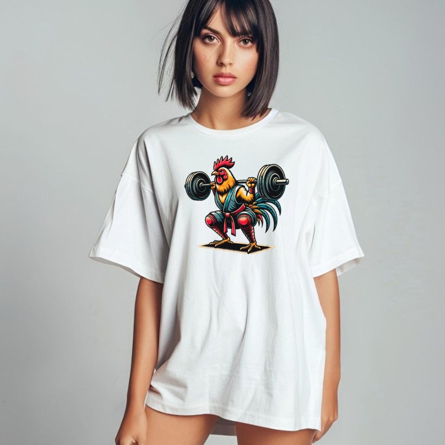 "Vibrant Lift Like a Rooster T-Shirt featuring a fearless chicken lifting weights, perfect for workouts and casual outings, embodying strength and humor."