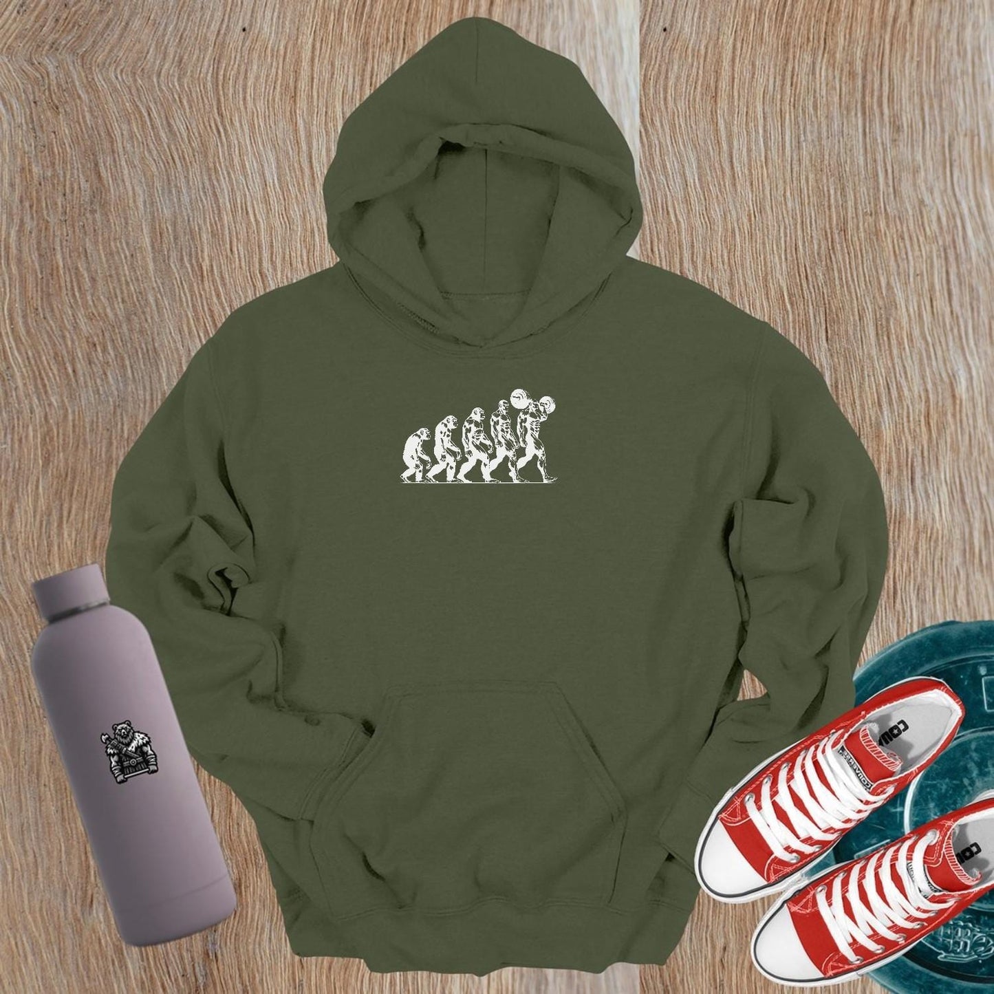 "Men's Evolution Hoodie: a stylish gym hoodie showcasing a dynamic design symbolizing strength and growth, ideal for workouts or casual wear."