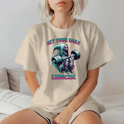 "Muted black T-shirt featuring a striking graphic of a skeleton lifting weights, promoting fitness motivation with a quirky style."