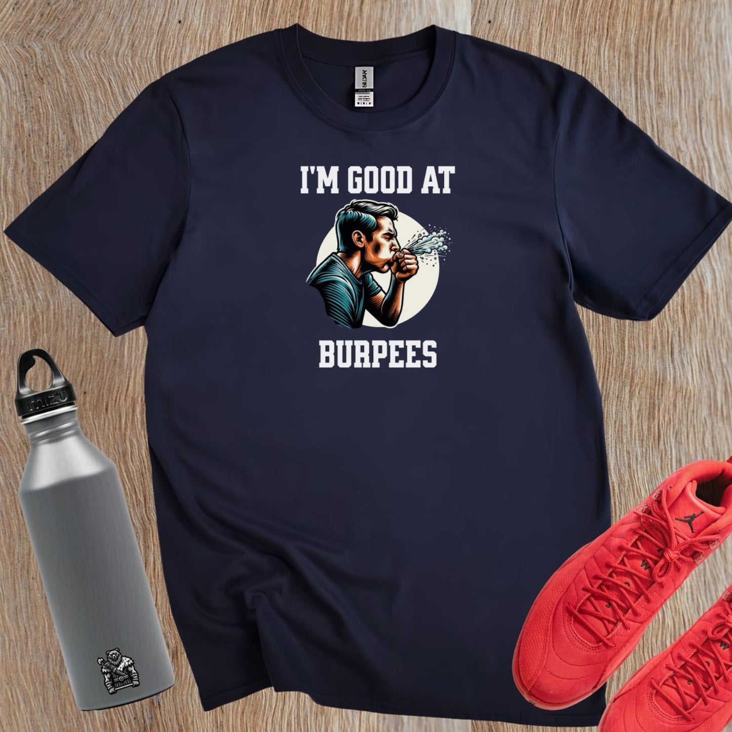 Alt text: "Bold fitness T-shirt featuring 'I'm Good at Burpees' graphic, perfect for gym enthusiasts. Ideal for workouts and motivation."