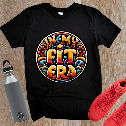 "Vibrant 'In My Fit Era' gym T-shirt featuring bold design, perfect for fitness enthusiasts. Ideal for workouts, stylish layering."