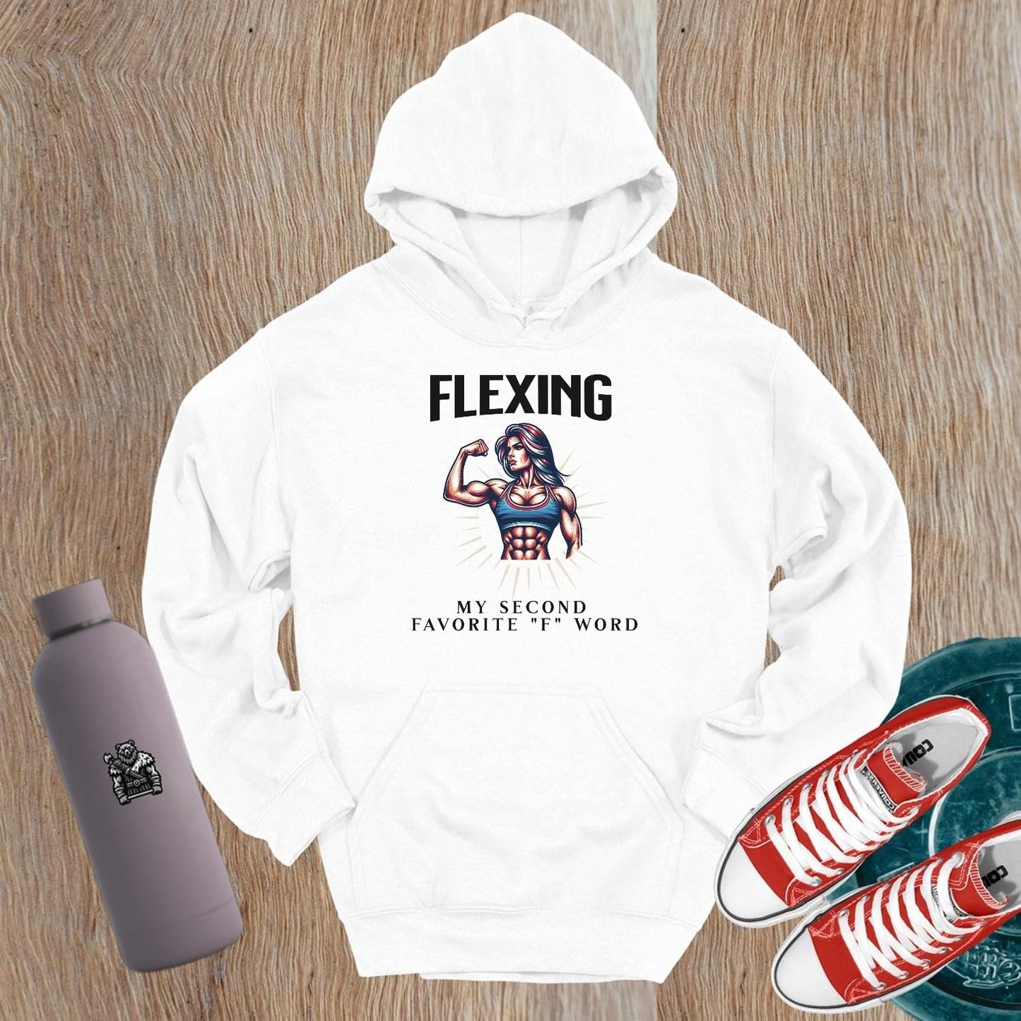 "Bold gym hoodie featuring a powerful graphic design celebrating strength and empowerment, perfect for workouts and casual wear."