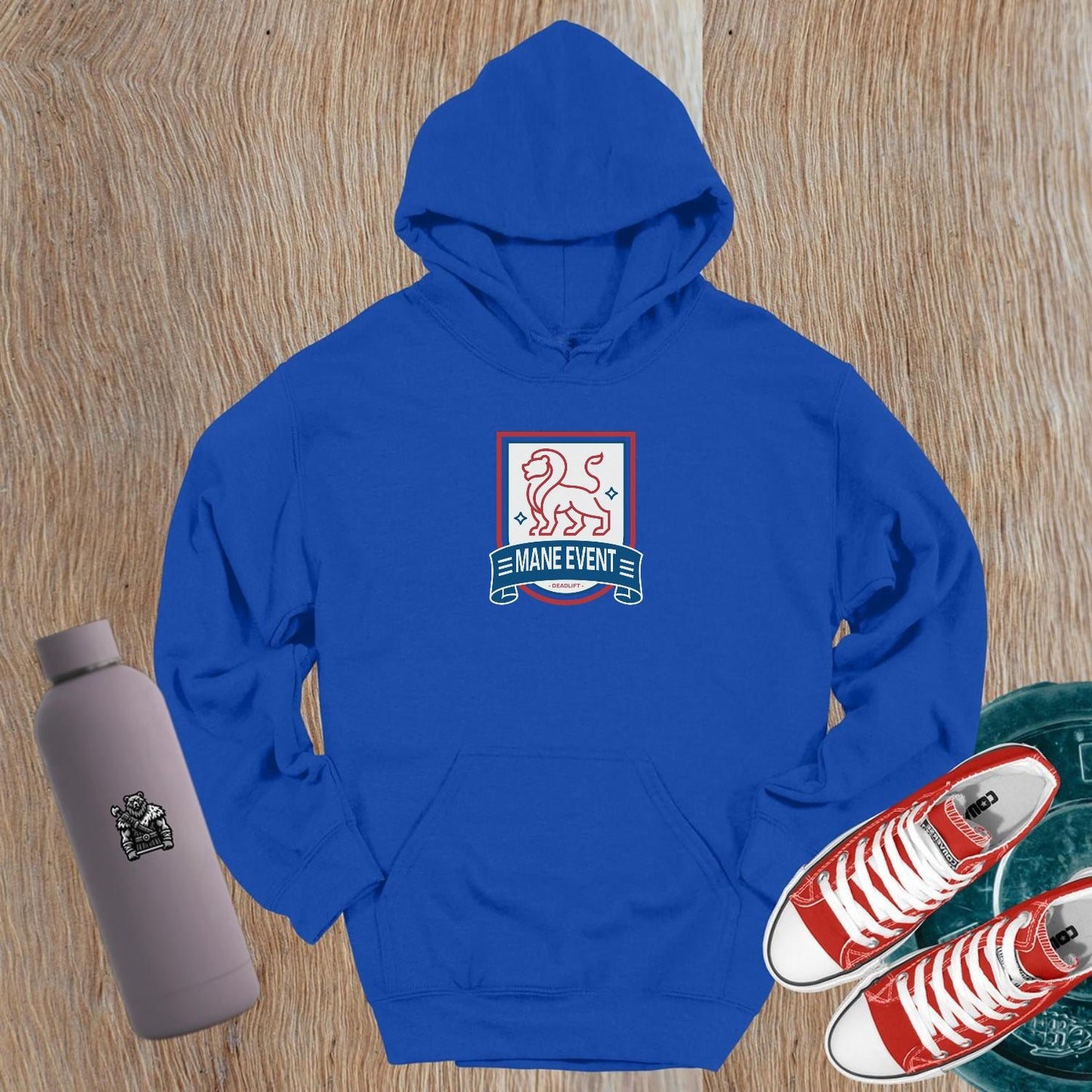 "Bold lion emblem hoodie for gym wear, ideal for lifters. Stylish design complements workouts, warm-ups, and post-gym relaxation."