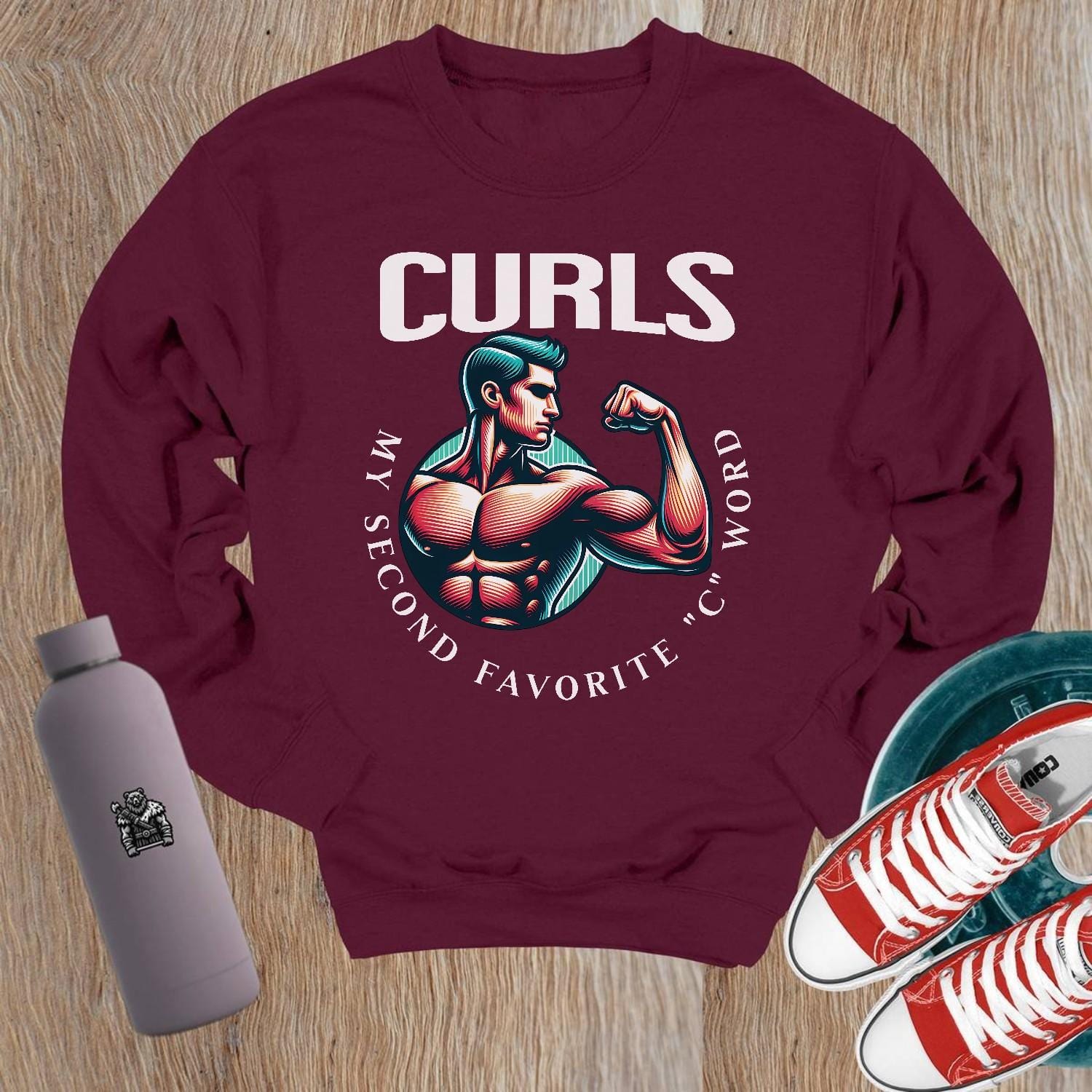 "Bold gym crewneck sweatshirt featuring 'CURLS: My Second Favorite C Word' graphic, celebrating strength and fitness style."