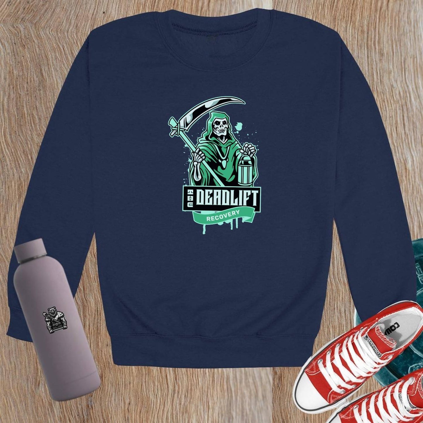 "Edgy black crewneck sweatshirt with 'Deadlift Recovery' graphic, perfect for gym enthusiasts and fitness lovers. Comfortable fit."