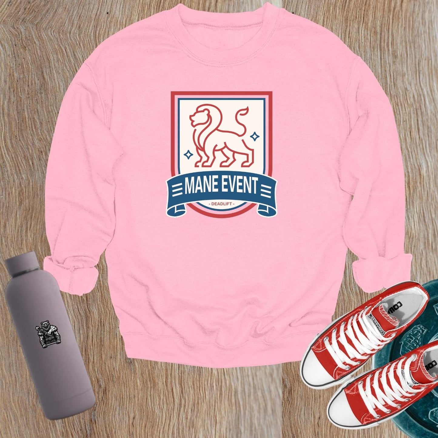 Alt text: "Bold lion emblem on a stylish gray crewneck sweatshirt for gym enthusiasts, perfect for workouts and casual lounging."