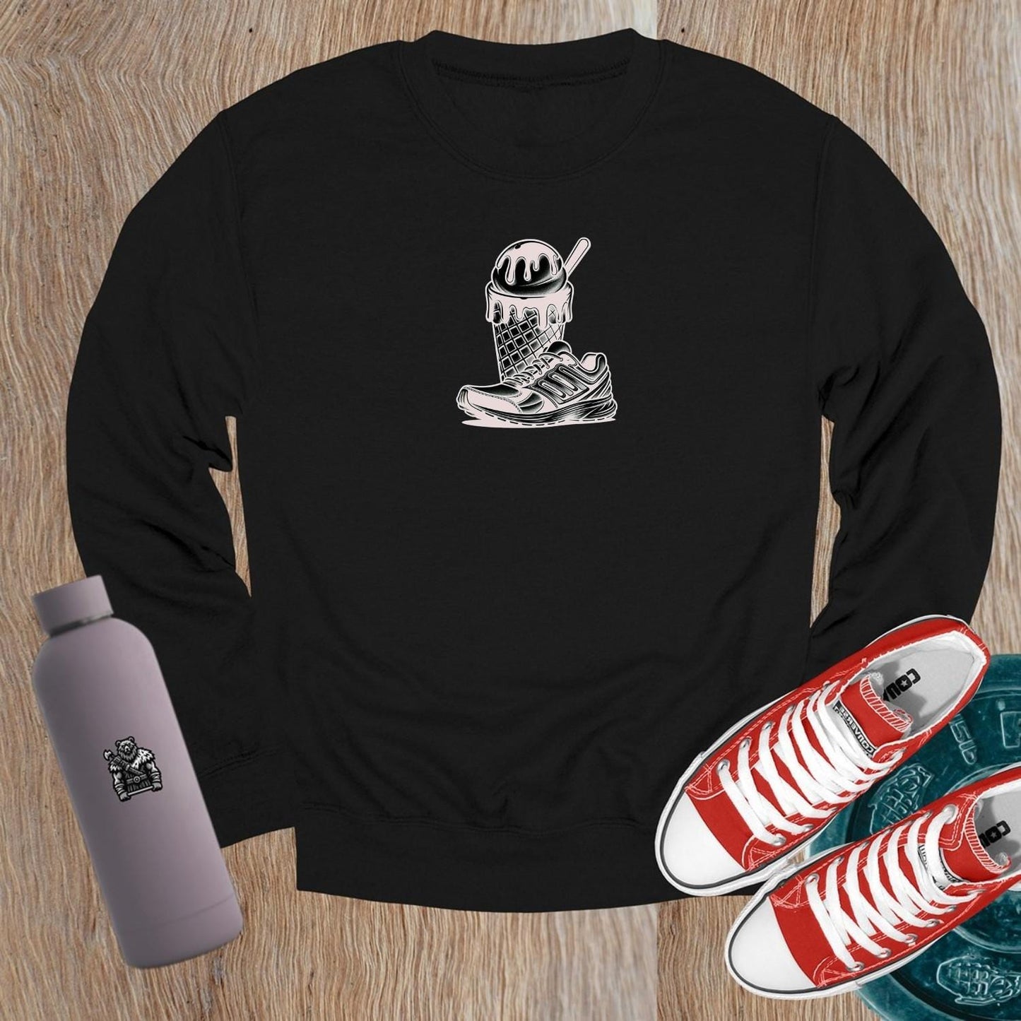 "Vibrant crewneck sweatshirt featuring a bold sneaker and melting ice cream cone design, perfect for gym enthusiasts who love style."