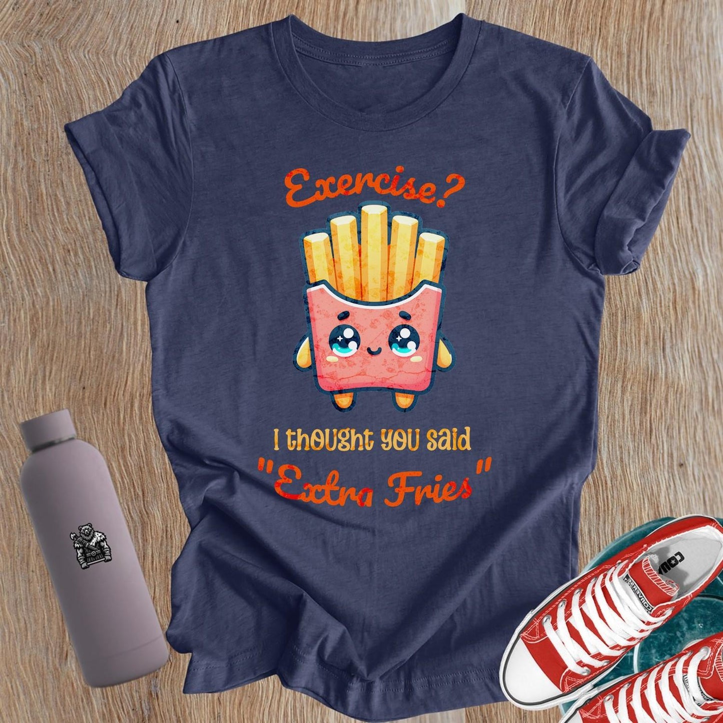 Cheeky "Extra Fries" T-shirt for women, blending fitness and humor. Perfect for confident gym-goers who embrace fun and balance!