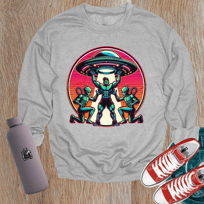 "Bold gym sweatshirt featuring a dynamic graphic of a muscular hero battling aliens, perfect for fitness enthusiasts and casual wear."