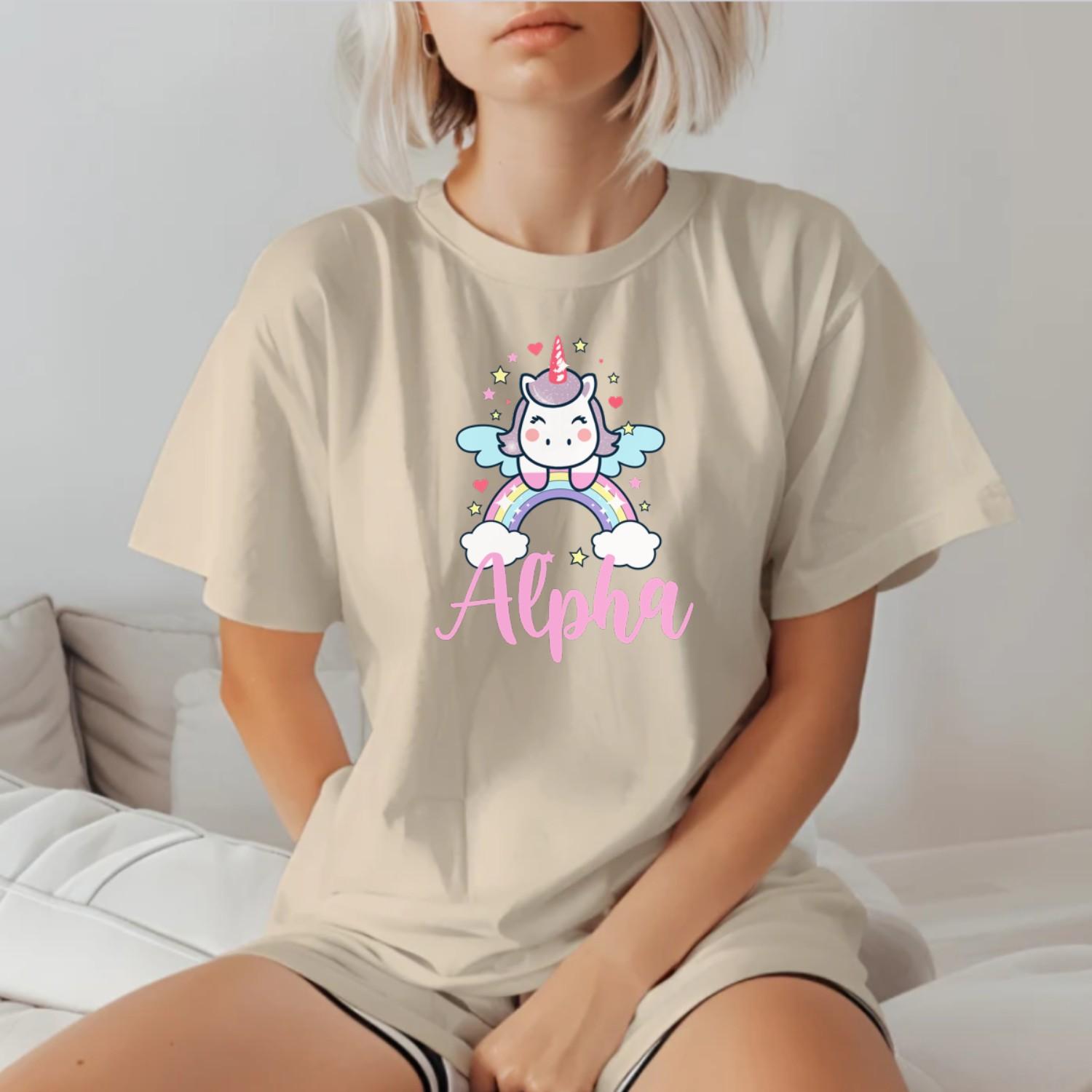 "Colorful Alpha T-shirt featuring a cute unicorn, rainbows, and sparkling stars, perfect for gym workouts and showcasing individuality."