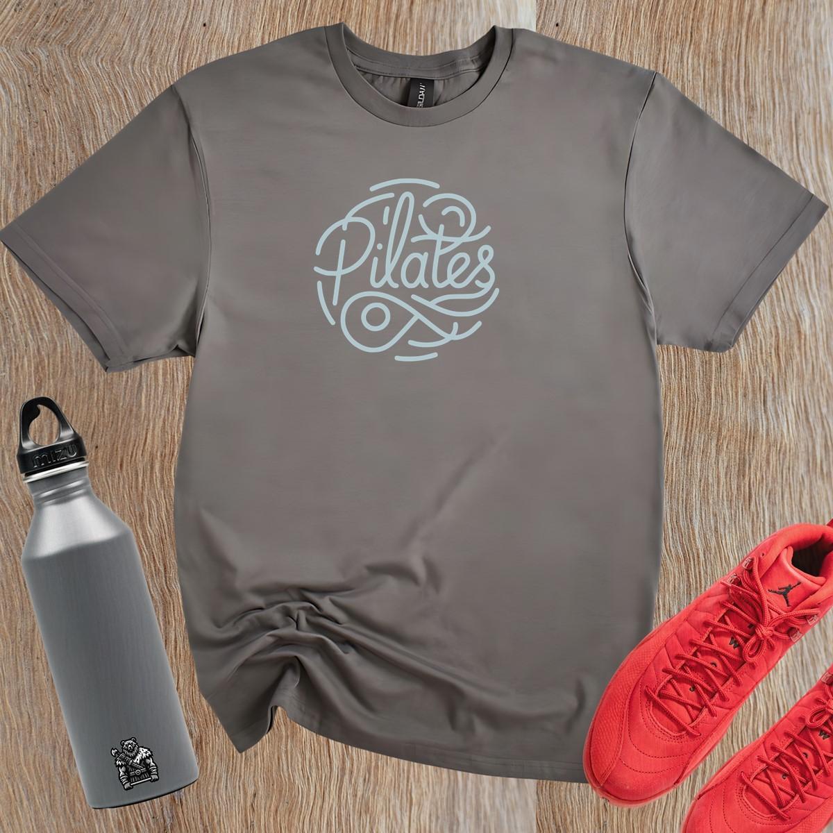 "Stylish Pilates T-shirt featuring an eye-catching graphic, perfect for fitness enthusiasts, combining comfort and motivation for workouts."