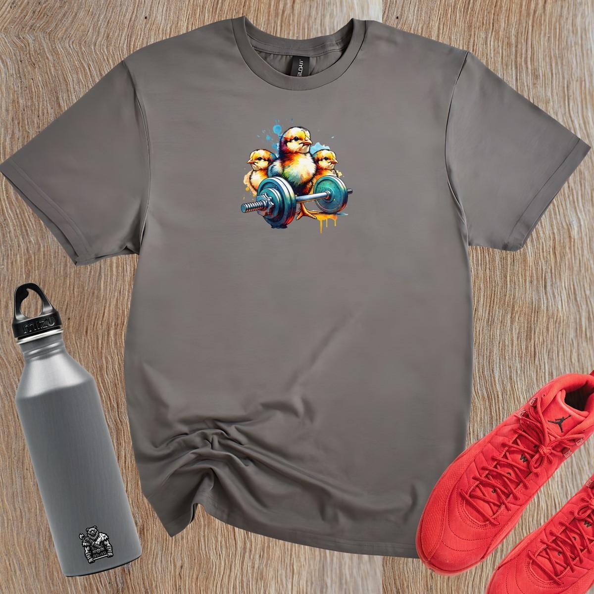 "Vibrant gym T-shirt featuring playful chicks lifting weights, showcasing a fun design for fitness enthusiasts. Perfect for workouts!"