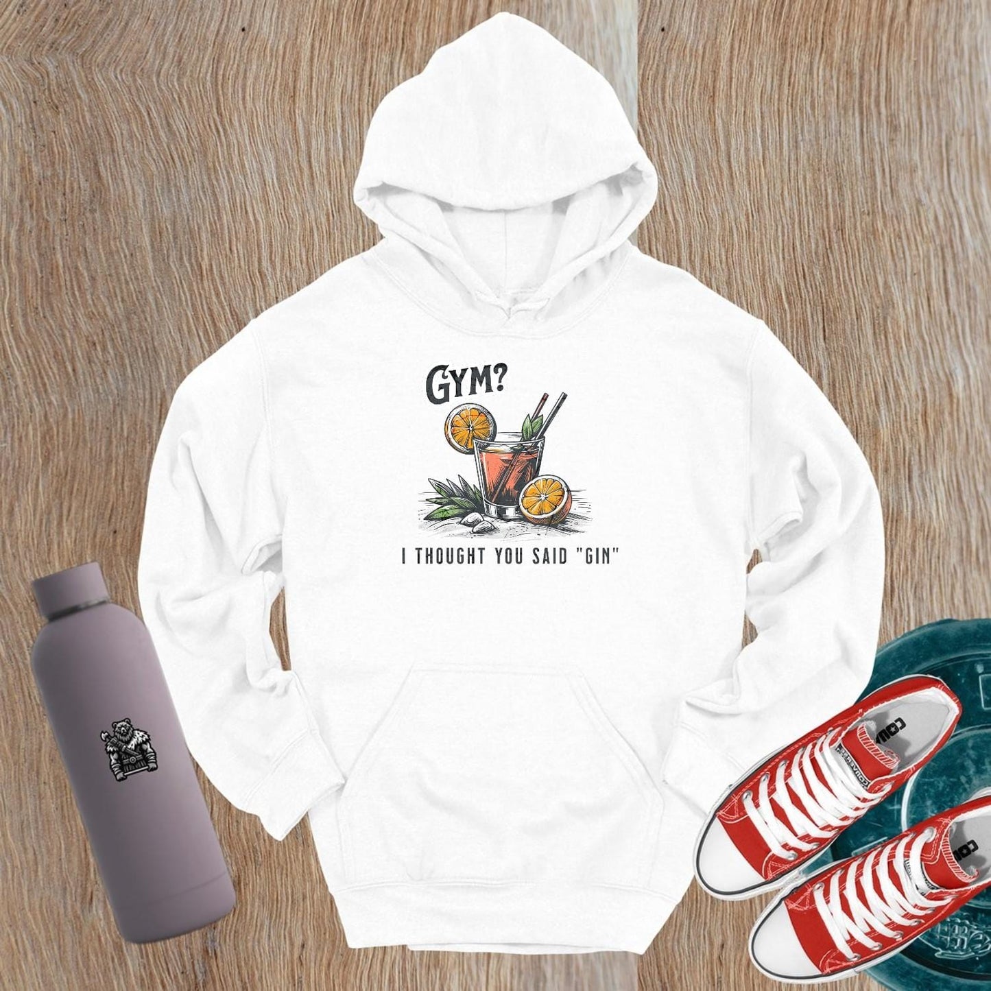 “Playful 'Gym? I Thought You Said ‘Gin’' hoodie featuring vibrant graphics, perfect for stylish workouts and casual outings.”
