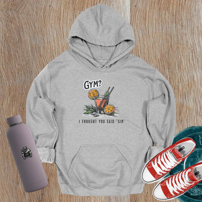 “Playful 'Gym? I Thought You Said ‘Gin’' hoodie featuring vibrant graphics, perfect for stylish workouts and casual outings.”