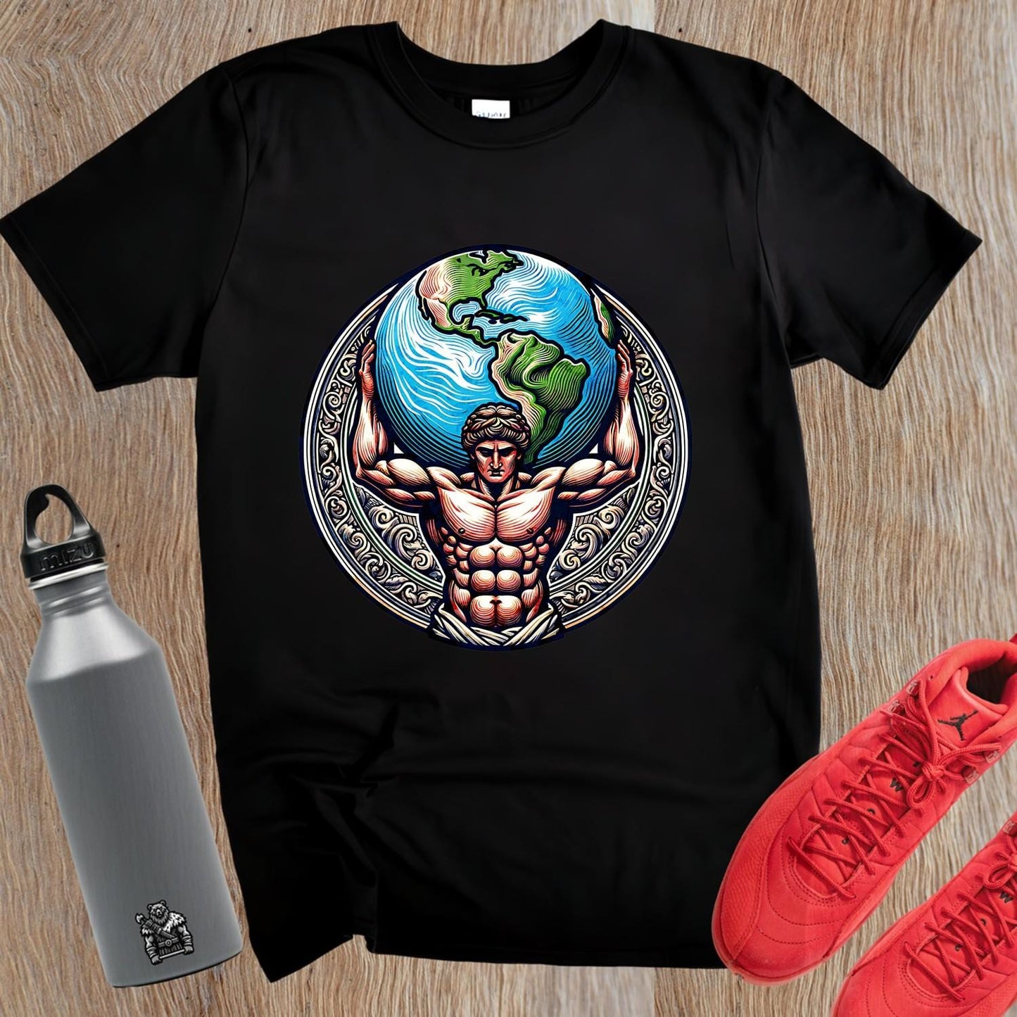 "Gym T-shirt featuring a strong figure holding the world, symbolizing strength and resilience, perfect for fitness enthusiasts."