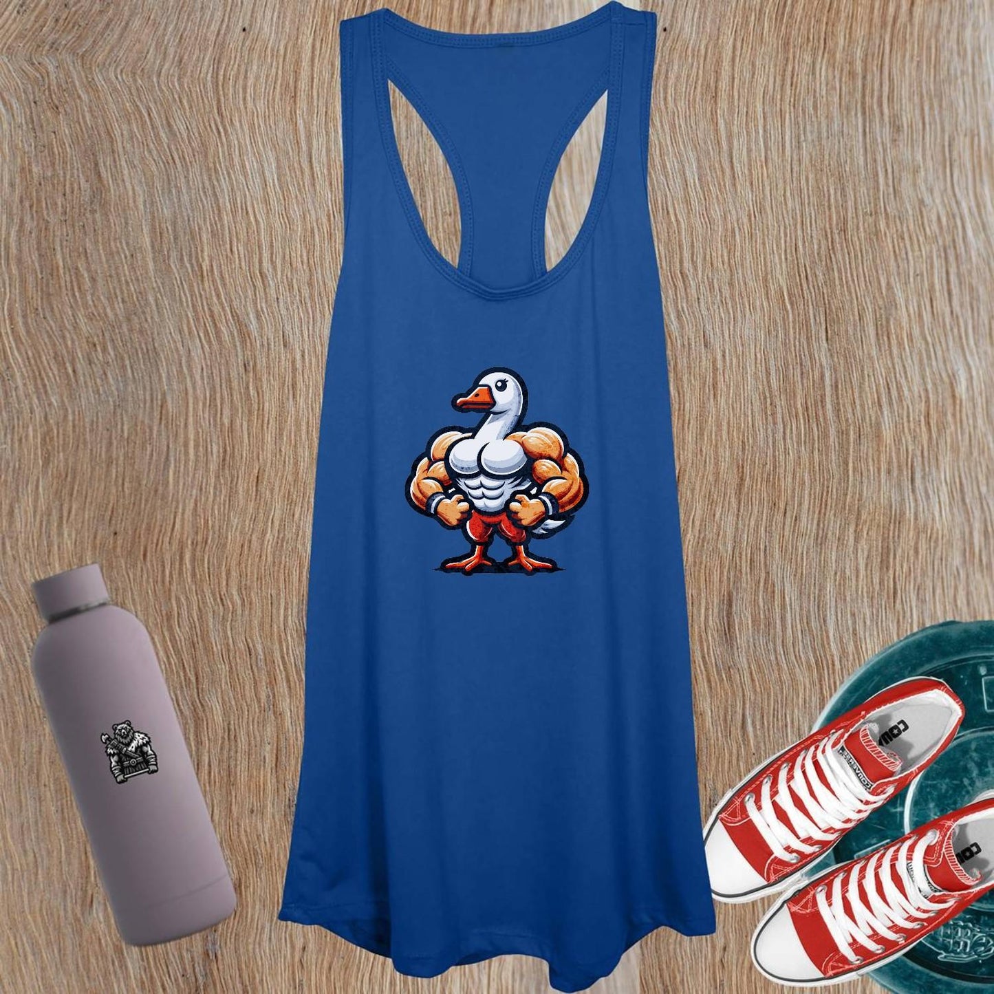 "Women's tank top with a unique muscular duck design, perfect for workouts or casual outings. Stylish activewear for fitness lovers."
