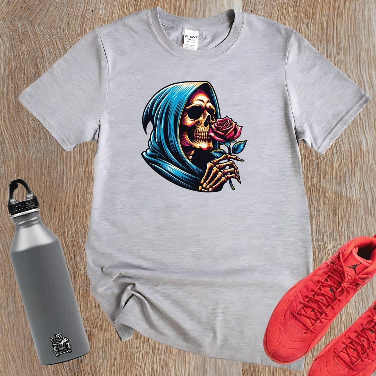 "Edgy gym T-shirt featuring a striking skeleton cradling a rose, combining elegance and strength for bold workout expression."