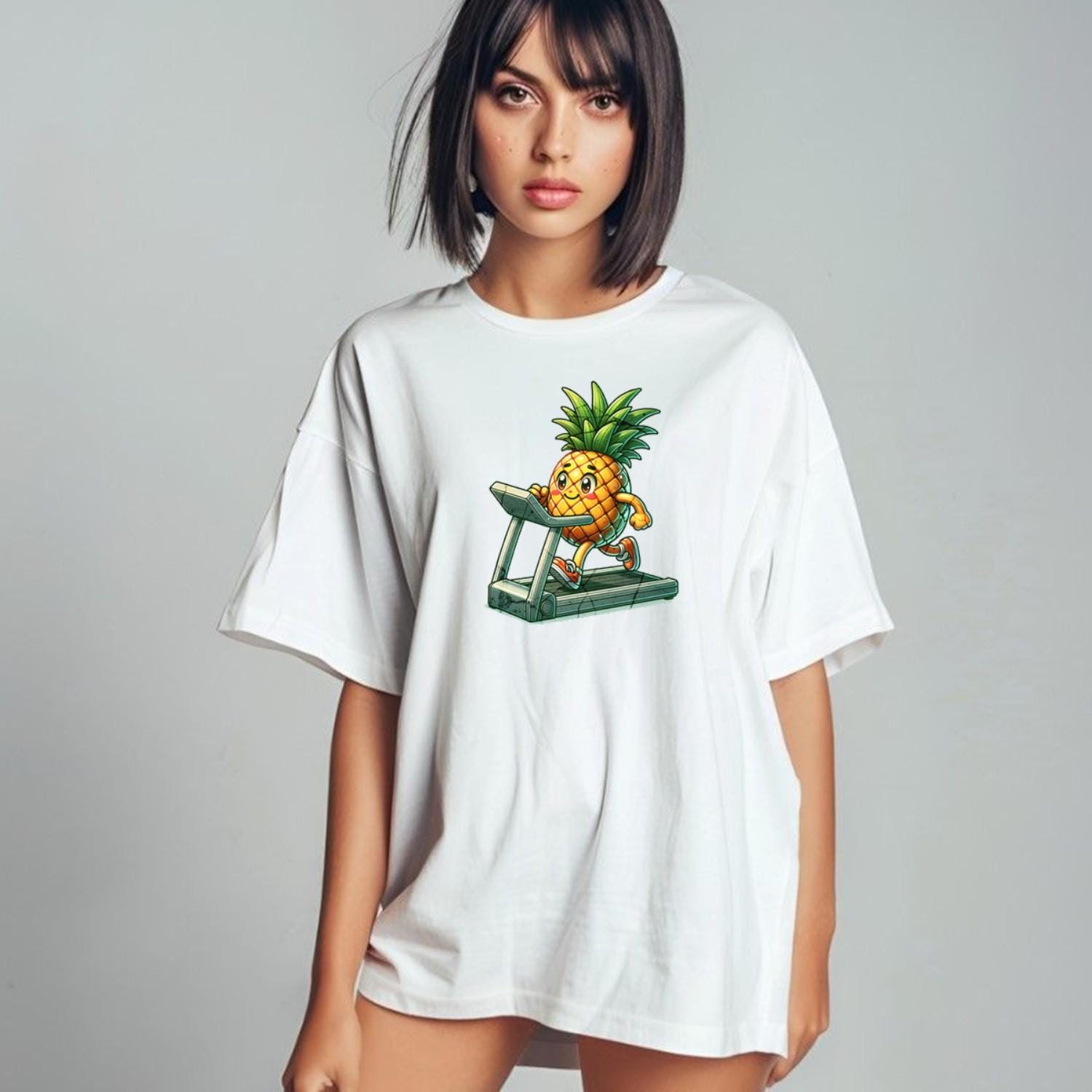 "Bright Pineapple Jogger T-Shirt featuring a cheerful pineapple exercising on a treadmill, promoting fun and motivation in fitness."