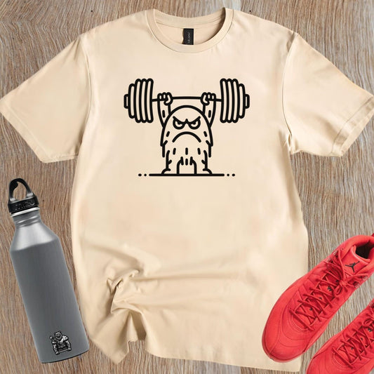 "Graphic T-shirt featuring a fierce creature lifting weights, perfect for gym enthusiasts. Motivational, stylish workout apparel design."