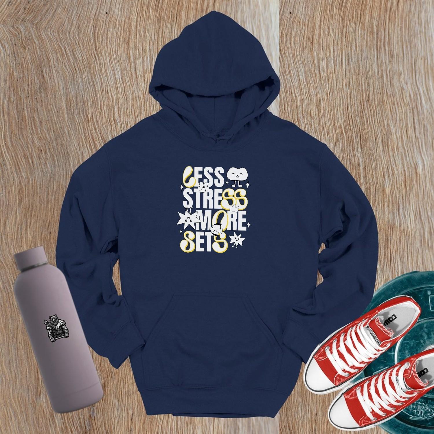 Vibrant gym hoodie featuring "Less Stress, More Sets!" motivational mantra, perfect for workouts and casual wear, embracing fitness fun.