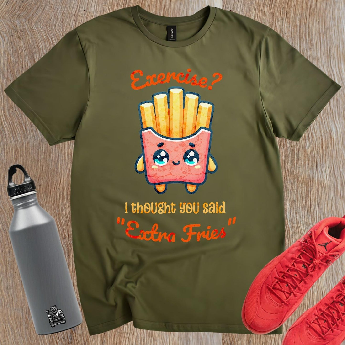 Alt text: "Humorous gym T-shirt featuring the phrase 'Exercise? I thought you said Extra Fries' in playful typography. Ideal for fitness lovers."