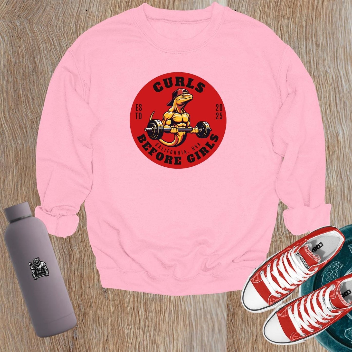 Alt text: "Bold gym crewneck sweatshirt featuring a muscular lizard lifting weights with 'Curls Before Girls' slogan. Perfect for fitness enthusiasts."