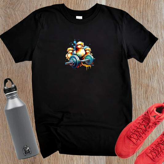 "Vibrant gym T-shirt featuring playful chicks lifting weights, showcasing a fun design for fitness enthusiasts. Perfect for workouts!"