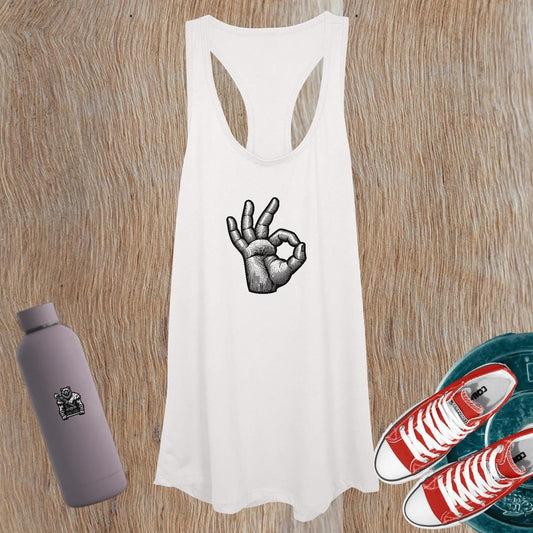 "Women's gym tank top in sleek design with bold motivational graphic, perfect for workouts and outdoor activities, offering breathability."