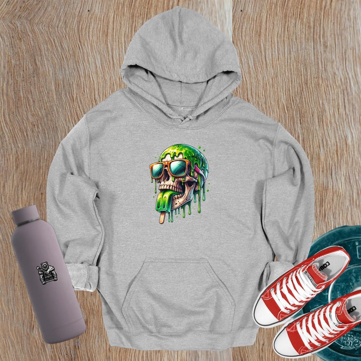 Alt text: "Bold Skull Pop Hoodie featuring a vibrant, dripping skull graphic, perfect for gym workouts and casual hangouts. Edgy design meets ultimate comfort."