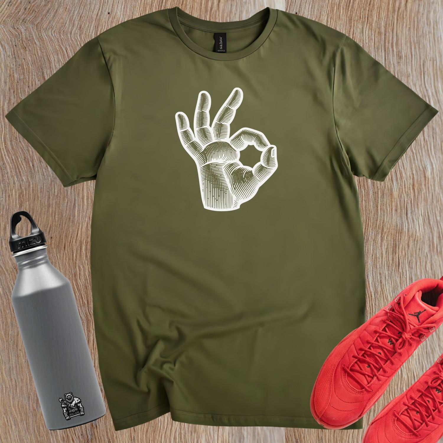 Alt text: "Bold graphic gym t-shirt featuring expressive hand design, perfect for fitness enthusiasts. Motivational workout apparel for lifting, running, and stretching."