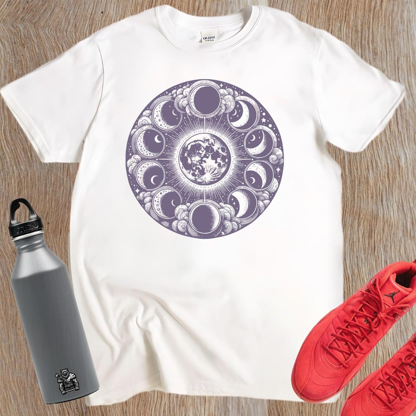 "Stylish Moon Phase T-Shirt for workouts, featuring a celestial design that inspires fitness motivation. Perfect for yoga and running."
