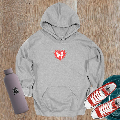 "Bold gym hoodie featuring a vibrant heart graphic and motivational design, perfect for fitness enthusiasts. Relaxed fit for comfort."