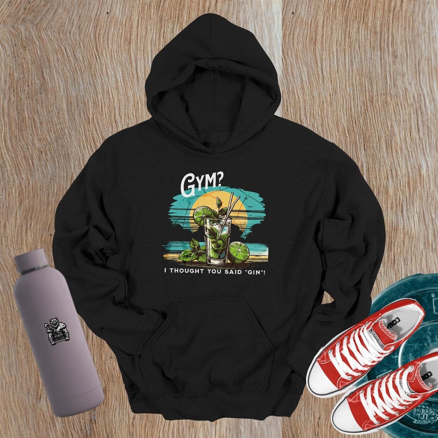 "Humorous 'Gym? I Thought You Said Gin' hoodie in vibrant colors, perfect for gym lovers and casual outings, showcasing playful style."