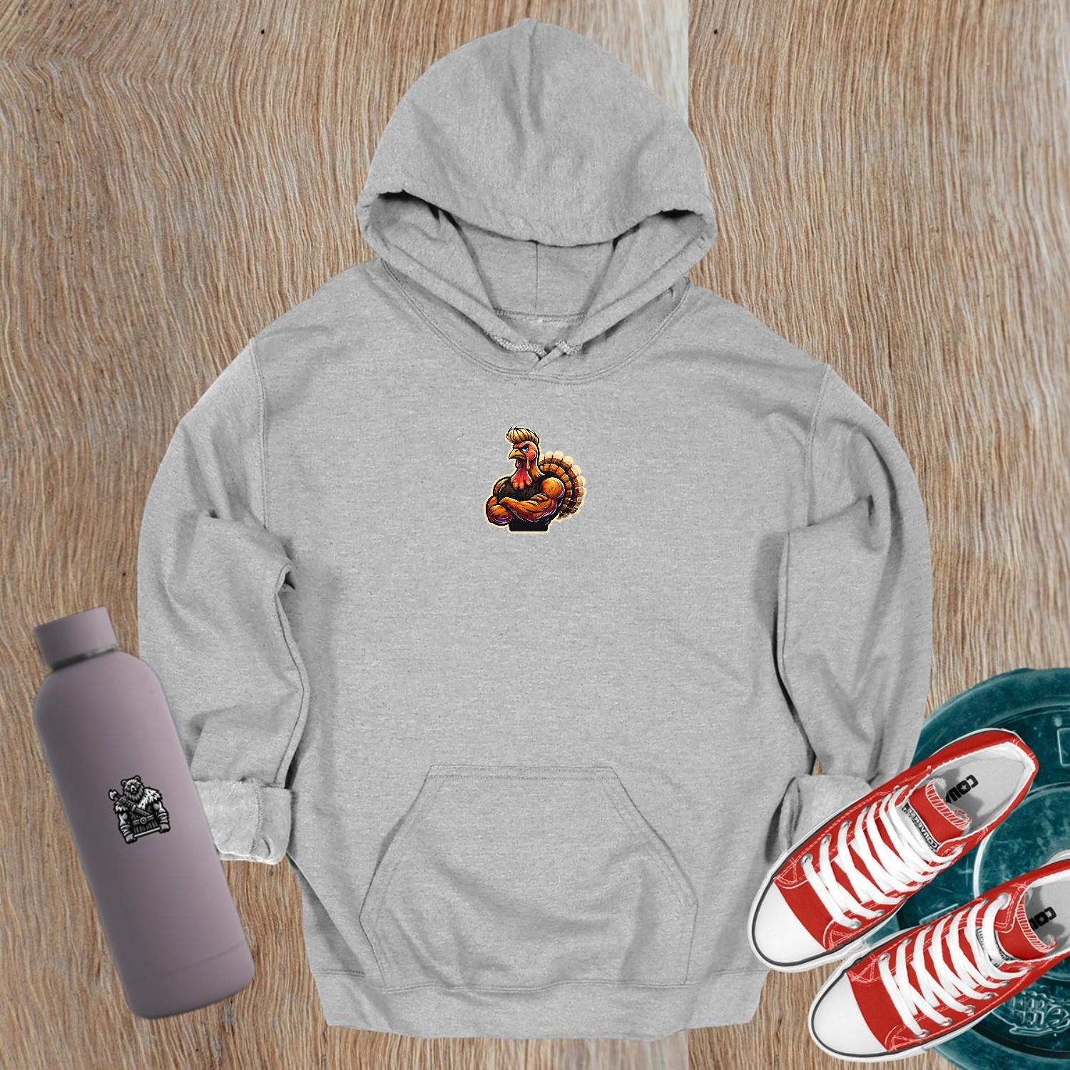 "Bold gym hoodie featuring a fierce, muscle-bound turkey design, perfect for workouts and casual wear, showcasing fitness and competitive spirit."