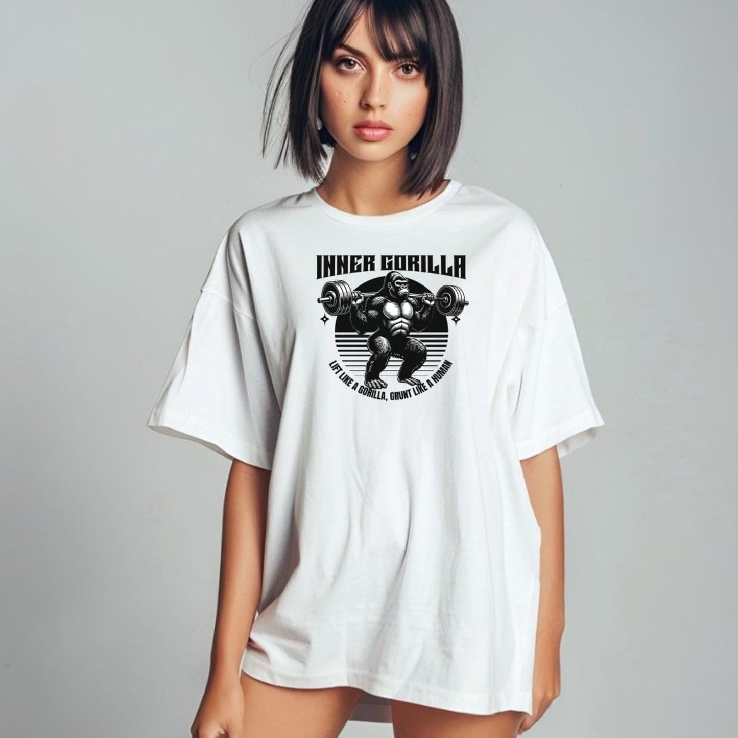 Alt text: "Gorilla Gym T-Shirt featuring a bold graphic of a powerful gorilla lifting weights, symbolizing strength and fitness motivation."