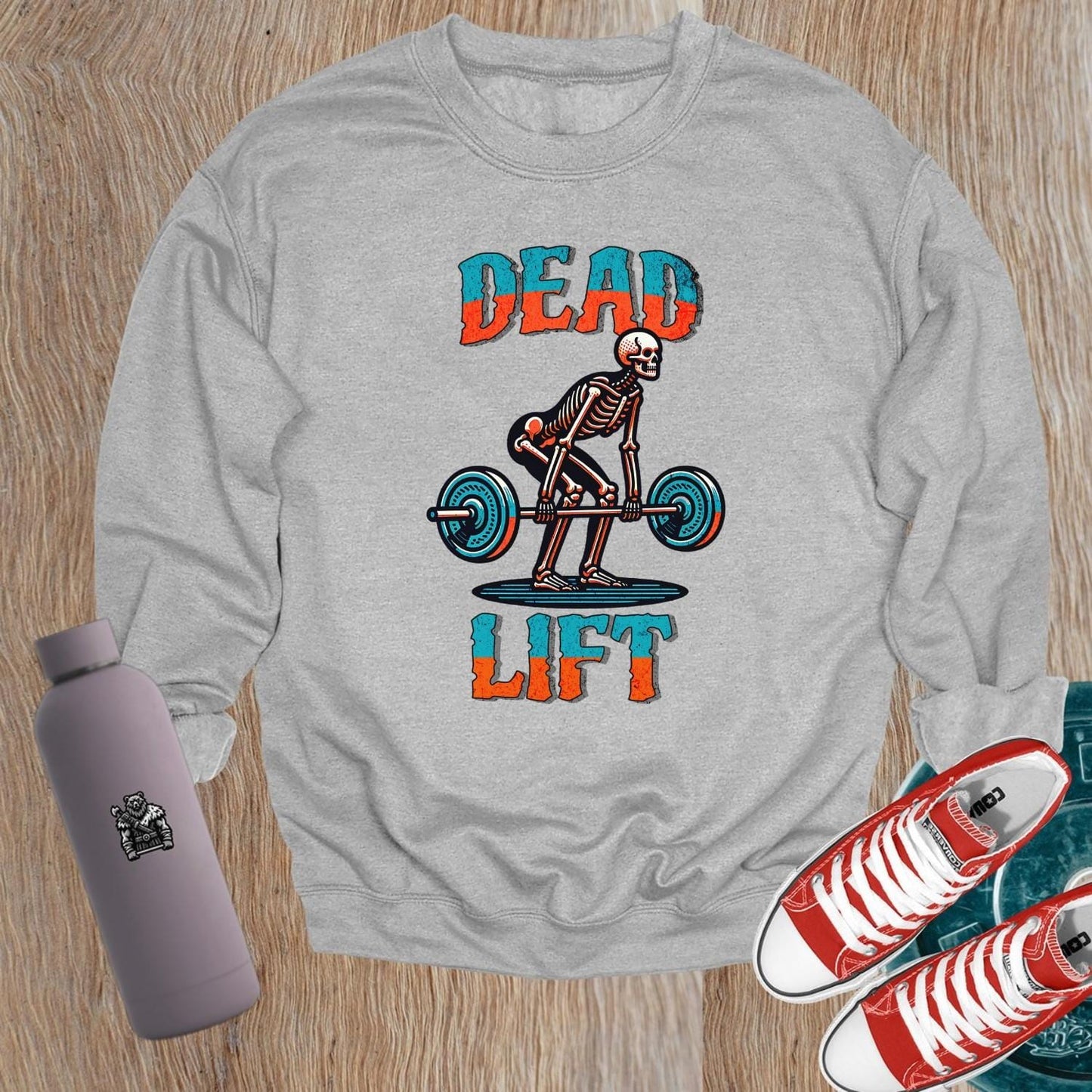 "Dead Lift sweatshirt featuring a bold skeleton graphic, perfect for gym workouts and casual wear. Stylish fitness apparel for lifting."