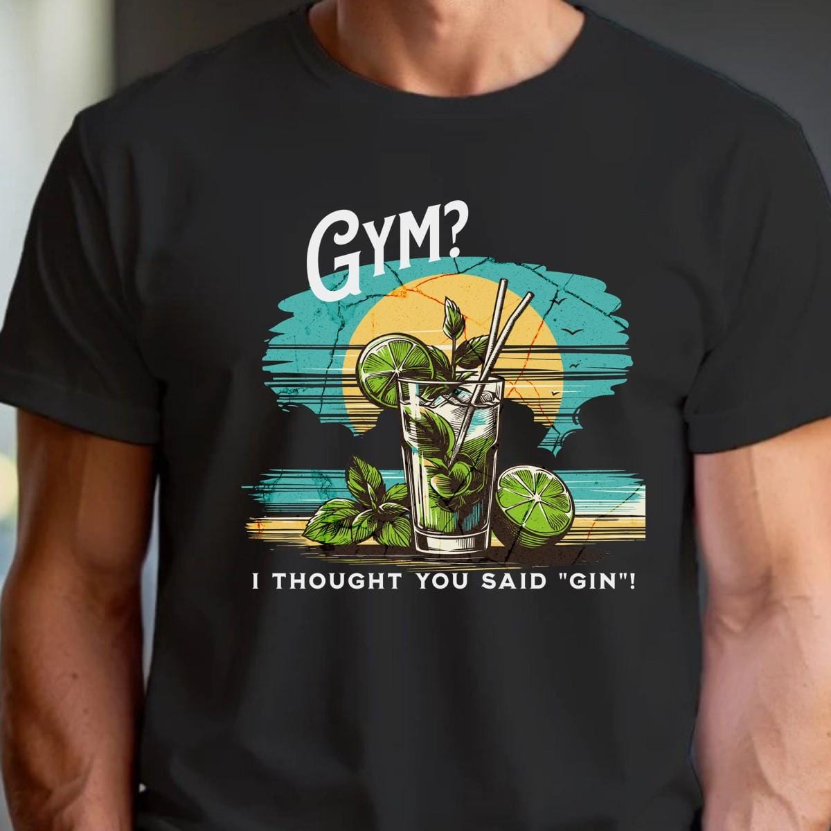 "Vibrant gym T-shirt featuring a colorful cocktail design with the playful phrase 'I thought you said “gin”!' Ideal for fitness lovers."