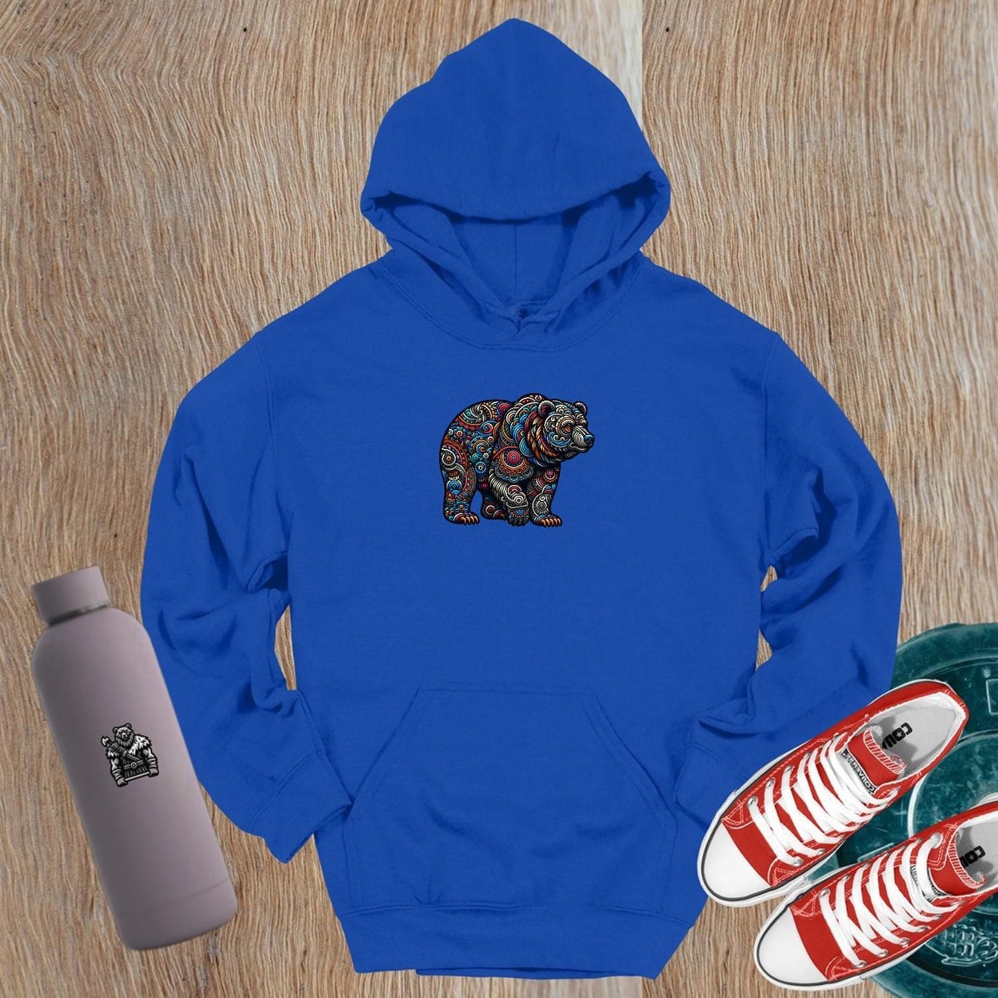 "Vibrant Bear Hoodie featuring intricate bear graphic, perfect for gym or casual wear. Symbolizes strength, resilience, and power."