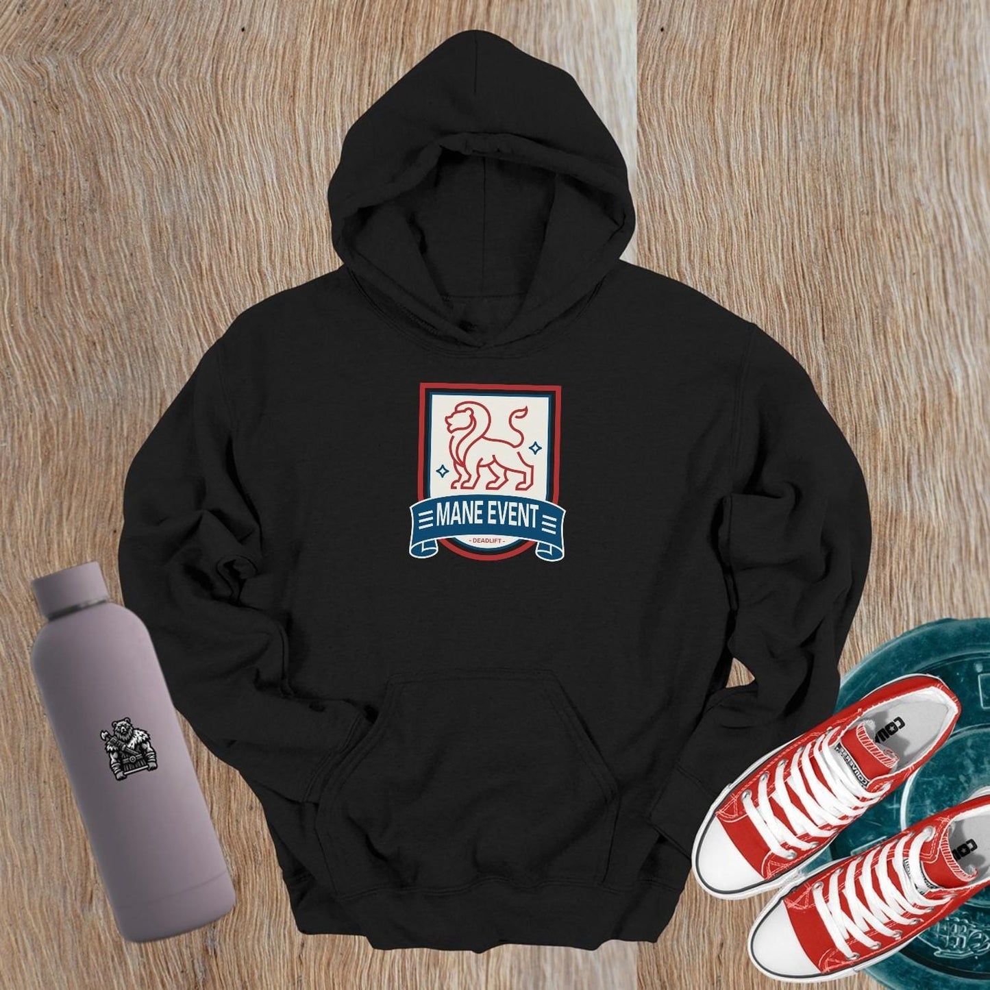 "Bold lion emblem hoodie for gym wear, ideal for lifters. Stylish design complements workouts, warm-ups, and post-gym relaxation."