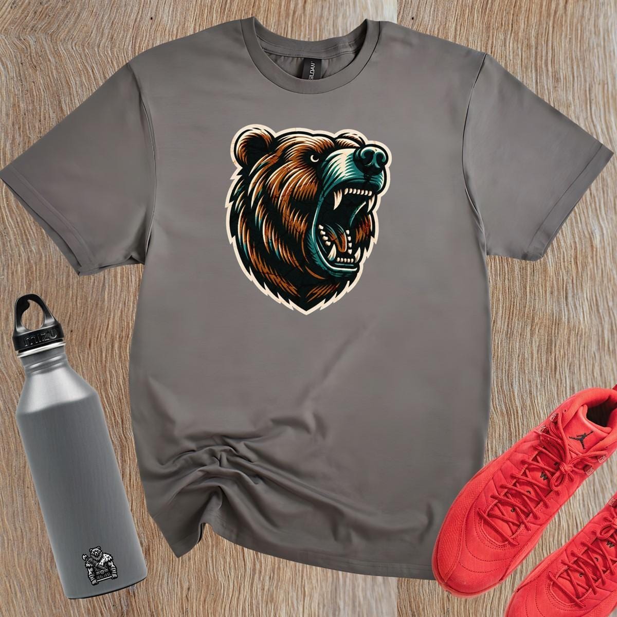 "Fierce bear graphic T-shirt for gym enthusiasts, symbolizing strength, resilience, and determination. Perfect for workouts and casual wear."