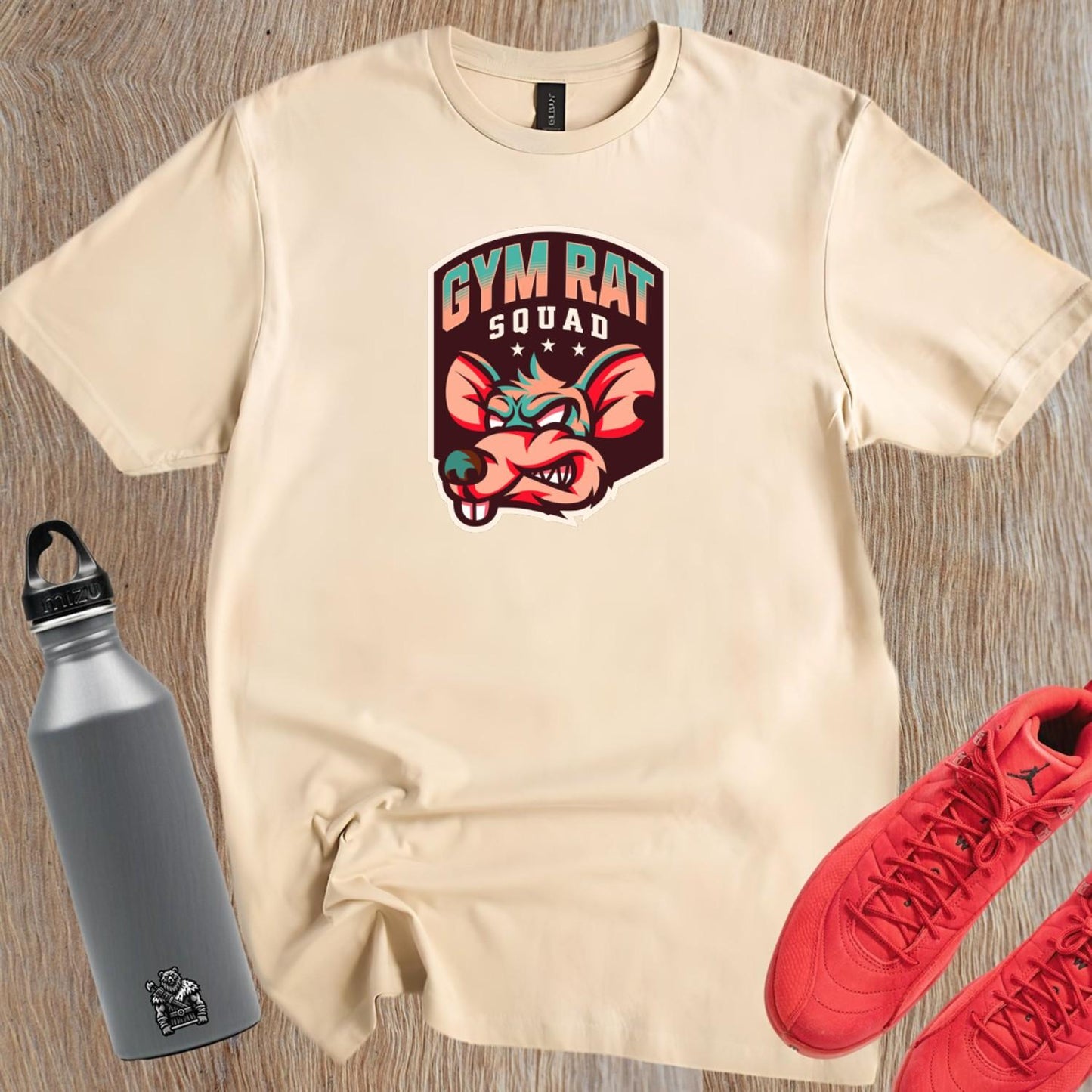 Alt text: "Bold Gym Rat Squad T-shirt featuring a fierce graphic design showcasing strength and determination, perfect for fitness enthusiasts."