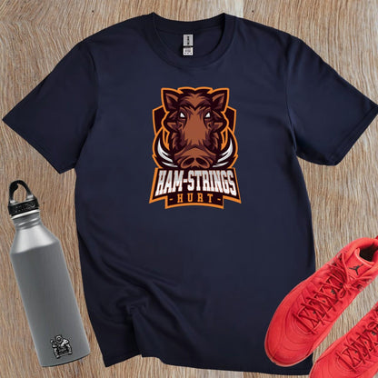 Alt text: "Bold gym T-shirt featuring a fierce wild boar graphic with the text 'Ham-Strings Hurt,' ideal for dedicated fitness enthusiasts."