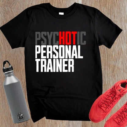 "Bold 'Psychotic Personal Trainer' gym T-shirt featuring edgy graphics, ideal for fitness enthusiasts who push limits and train hard."